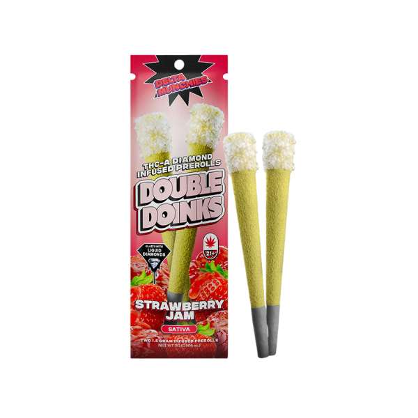 A package labeled "Delta Munchies THC-A Diamond Infused Prerolls | 2pk" with two Delta Munchies THC-A diamond-infused prerolls next to it. The packaging indicates THC-A Diamond Infused Pre-rolls in the Strawberry Jam flavor, marked as Sativa.