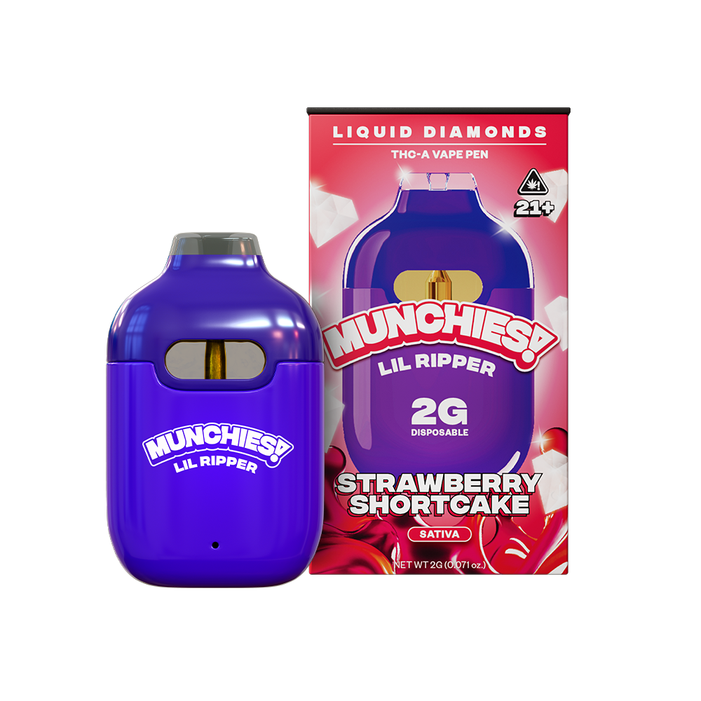A purple disposable vape pen labeled "Delta Munchies: Munchies Lil Ripper THCA Disposable Vape | 2g" is placed next to its box, featuring a strawberry shortcake design and a 21+ age warning.